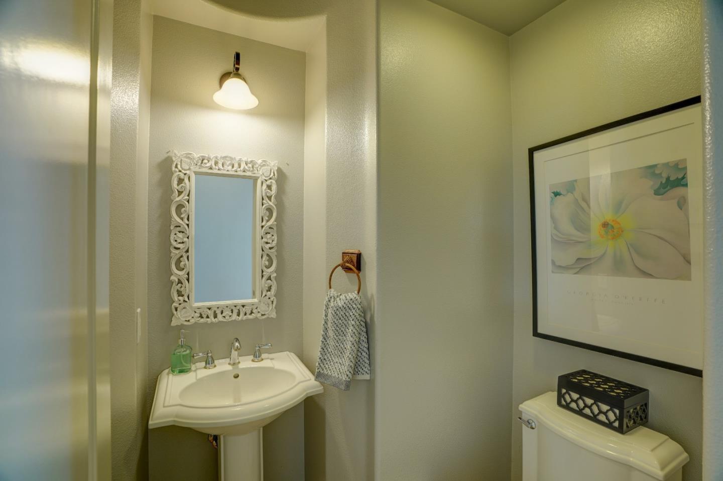 2860 Club Drive Gilroy, CA 95020 - Photo 28 of 87 a bathroom with a sink and mirror with toilet