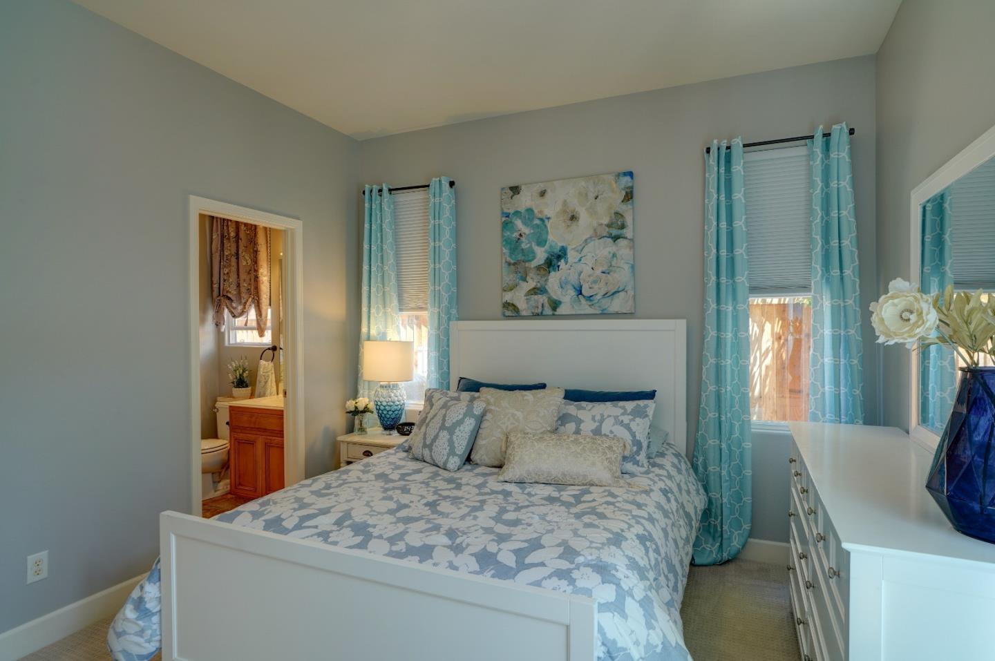 2860 Club Drive Gilroy, CA 95020 - Photo 34 of 87 a bedroom with a bed and wooden floor