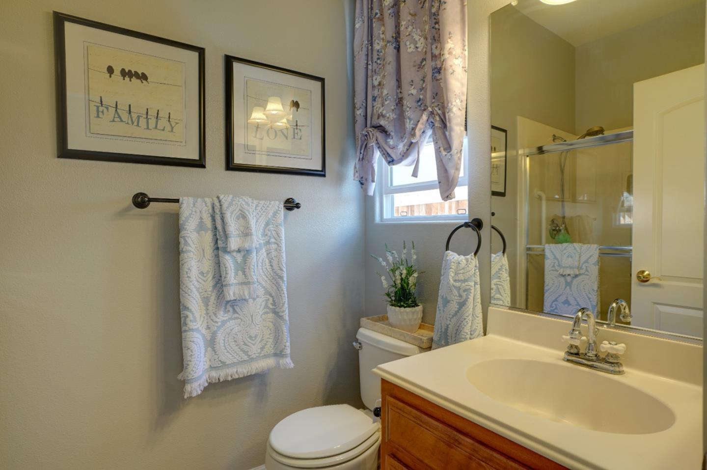 2860 Club Drive Gilroy, CA 95020 - Photo 35 of 87 a bathroom with a sink toilet and shower