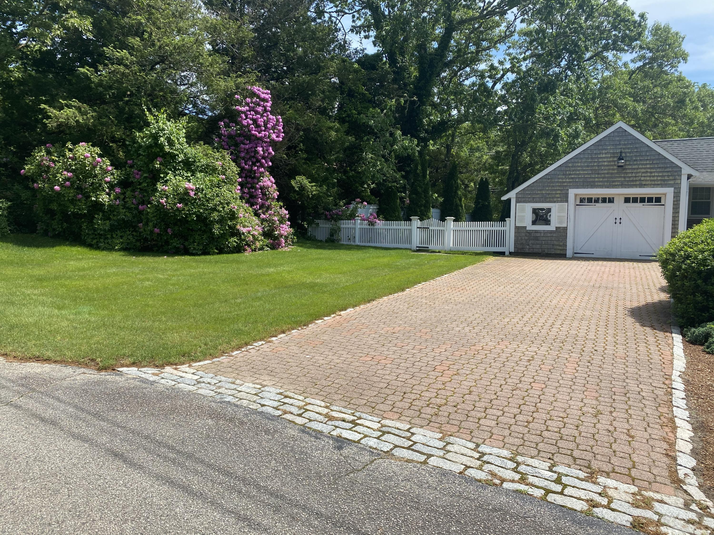 12 Nemasket Road Falmouth, MA 02540 - Photo 23 of 23 a front view of house with yard and green space