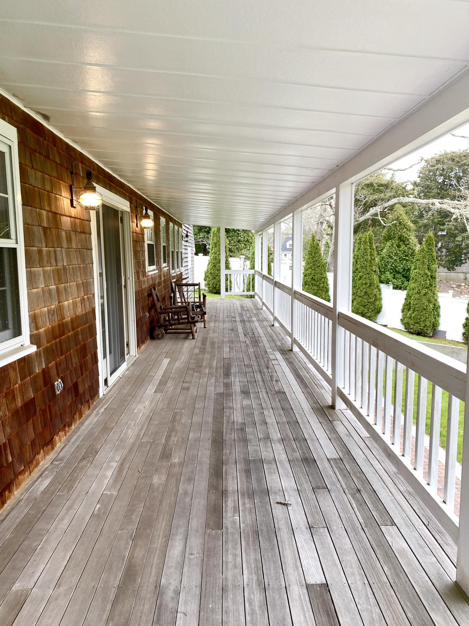 12 Nemasket Road Falmouth, MA 02540 - Photo 4 of 23 a view of porch with wooden floor