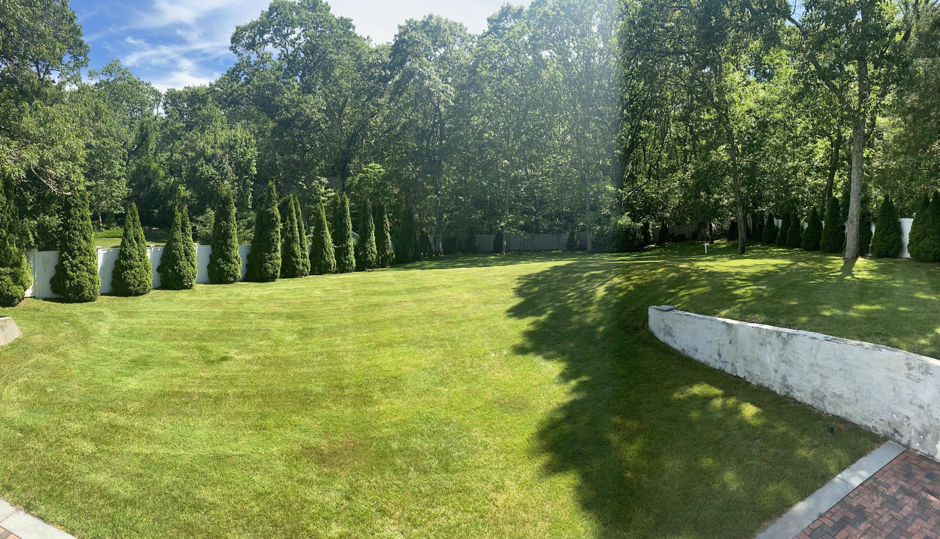 12 Nemasket Road Falmouth, MA 02540 - Photo 5 of 23 a view of a golf course with a garden