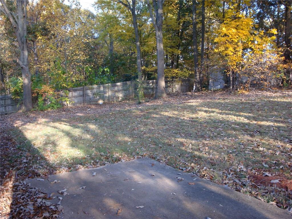 568 Russell Road Lawrenceville, GA 30043 - Photo 13 of 20 a view of a yard with trees