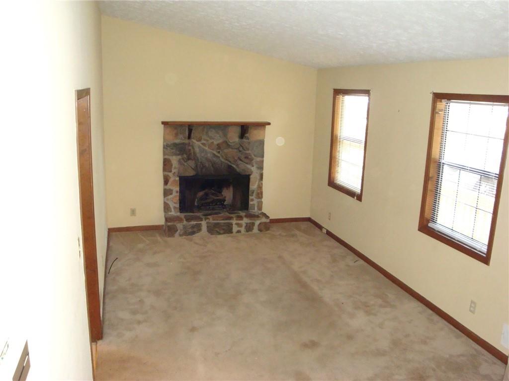 568 Russell Road Lawrenceville, GA 30043 - Photo 8 of 20 a view of an empty room with a window