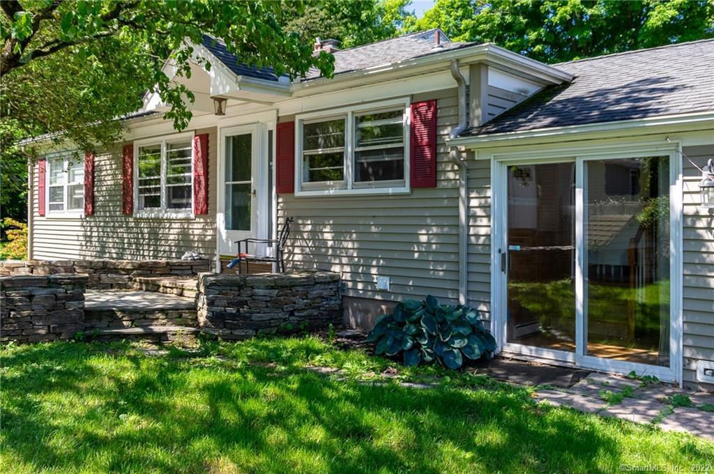165 Creamery Road Durham, CT 06422 - Photo 1 of 1 Front Entrance Exterior/ sliders to Family room/stone patio