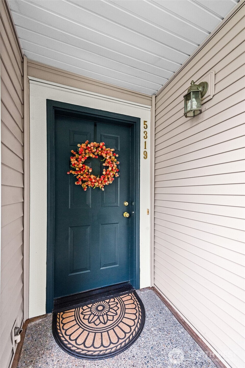 a view of a livingroom with a fountain and a fireplace