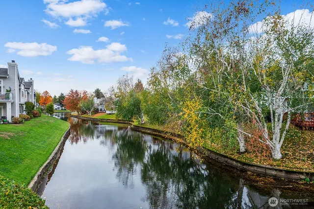 a view of a lake with a outdoor space