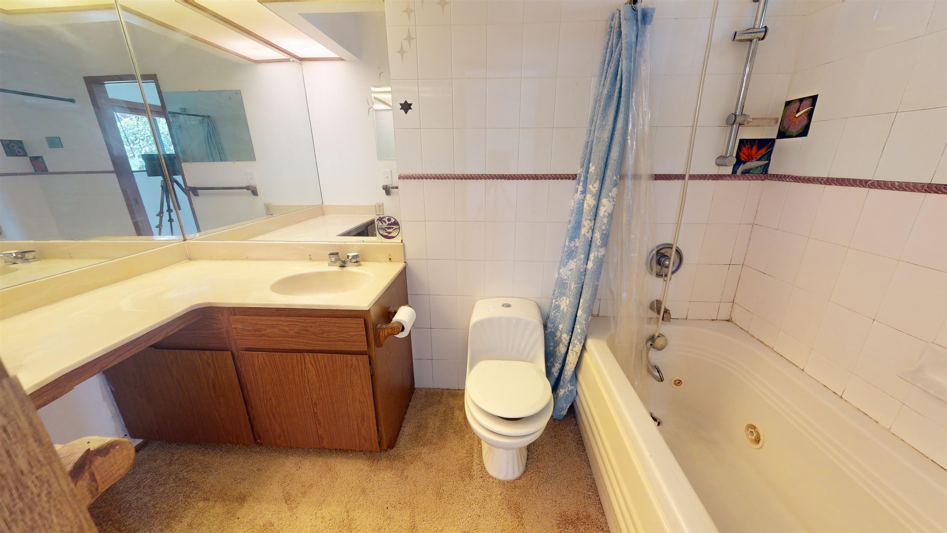 77 Kahoea Place Kula, HI 96790 - Photo 20 of 44 a bathroom with a sink toilet and shower