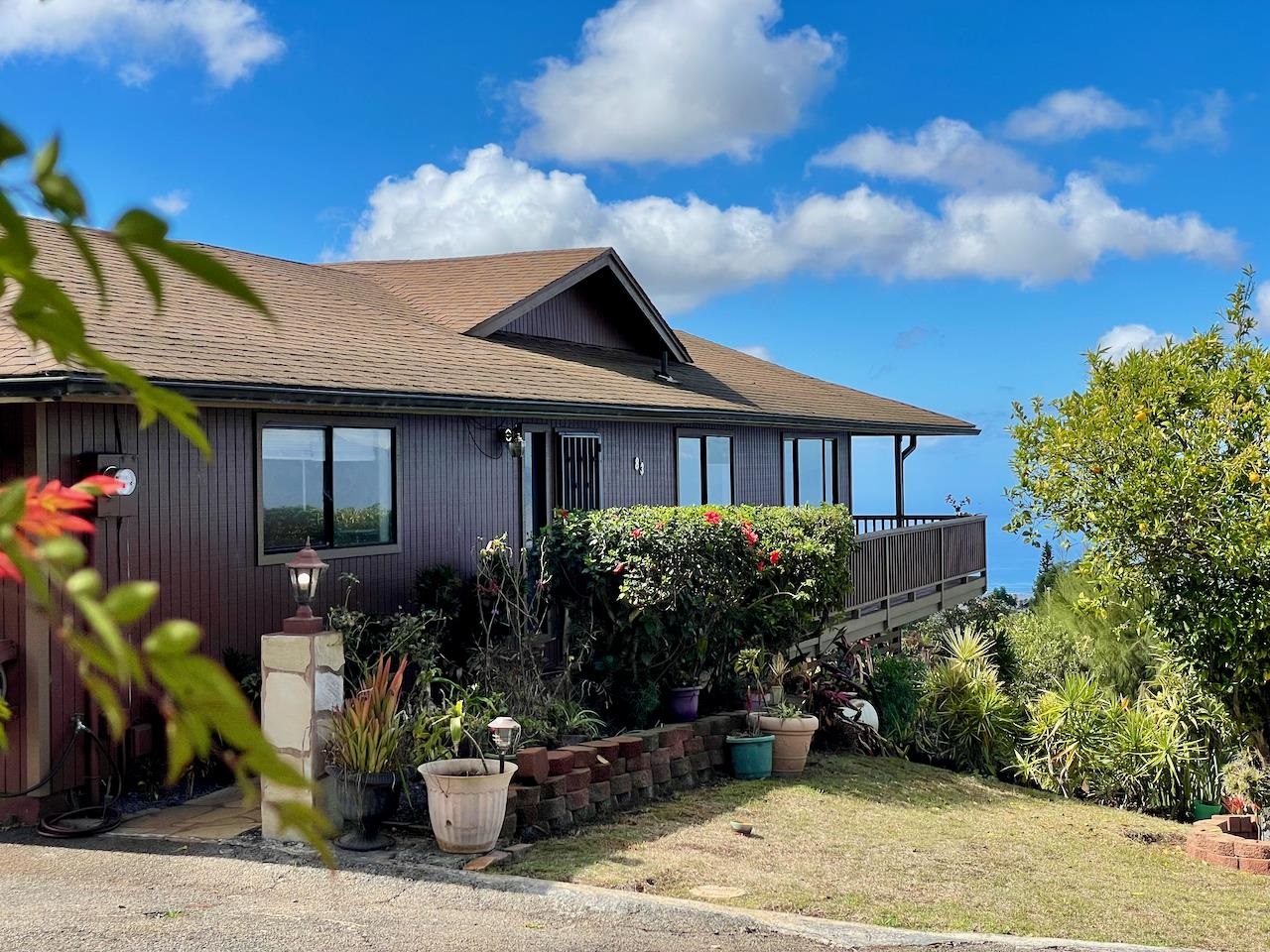 77 Kahoea Place Kula, HI 96790 - Photo 2 of 44 a front view of house with yard