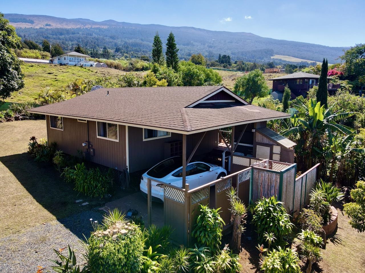 77 Kahoea Place Kula, HI 96790 - Photo 23 of 44 an aerial view of a house with a garden