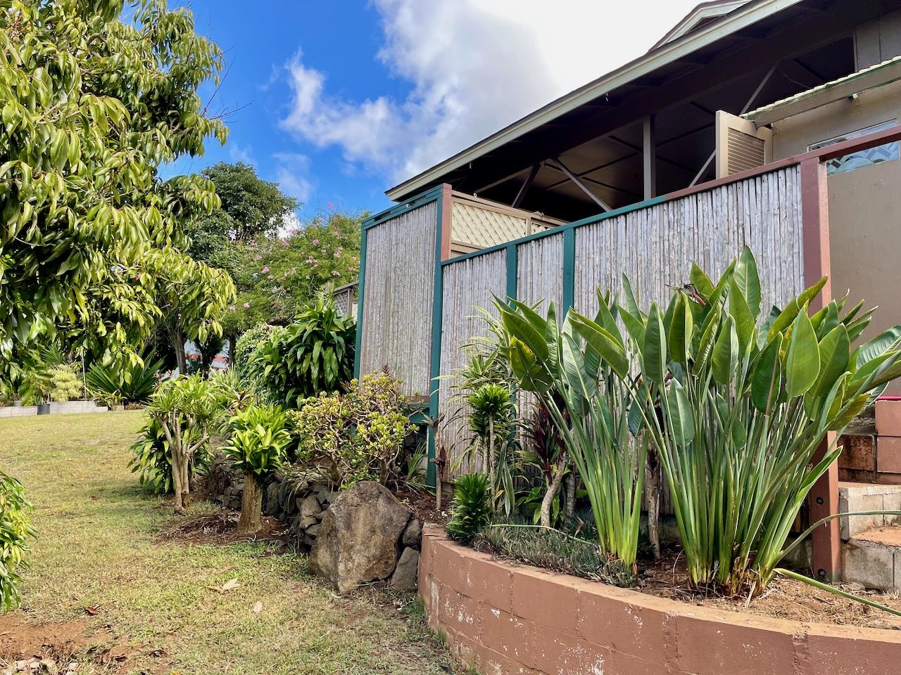 77 Kahoea Place Kula, HI 96790 - Photo 24 of 44 a view of a garden in front of a house