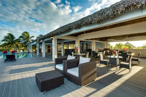 a view of a house with lake view and a lake view
