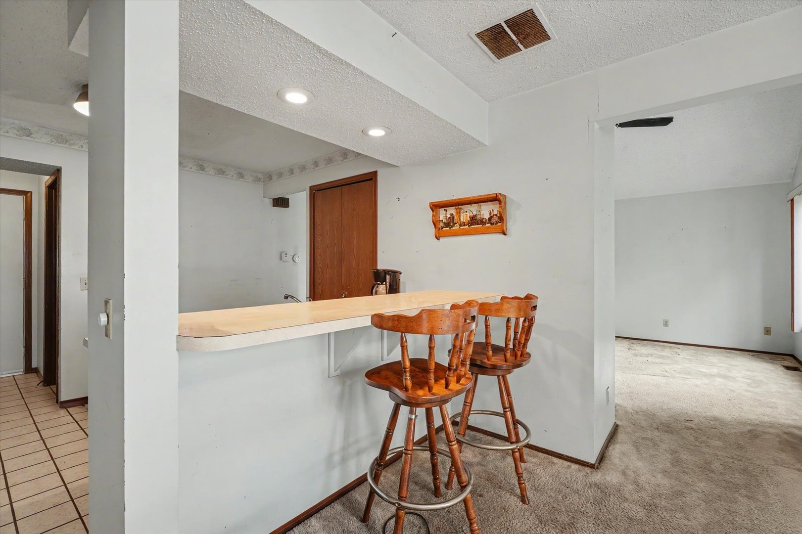 711 Higgins Road Champaign, IL 61822 - Photo 12 of 23 a view of a dining room with furniture and wooden floor