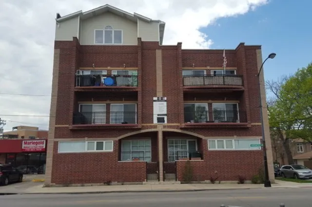 a view of a big building with large windows