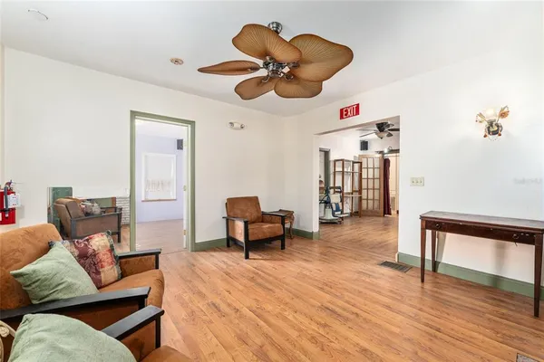 a white bath tub sitting next to a white toilet
