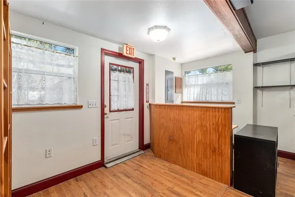 a kitchen with sink and cabinets