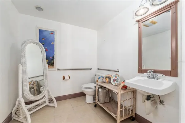 a picture of a bathroom with a shower