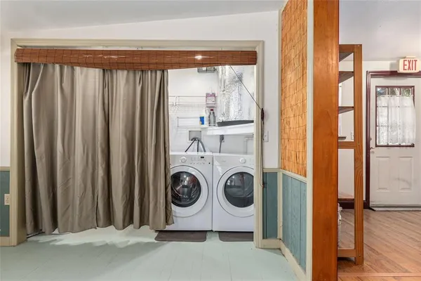 a view of a lake with green space