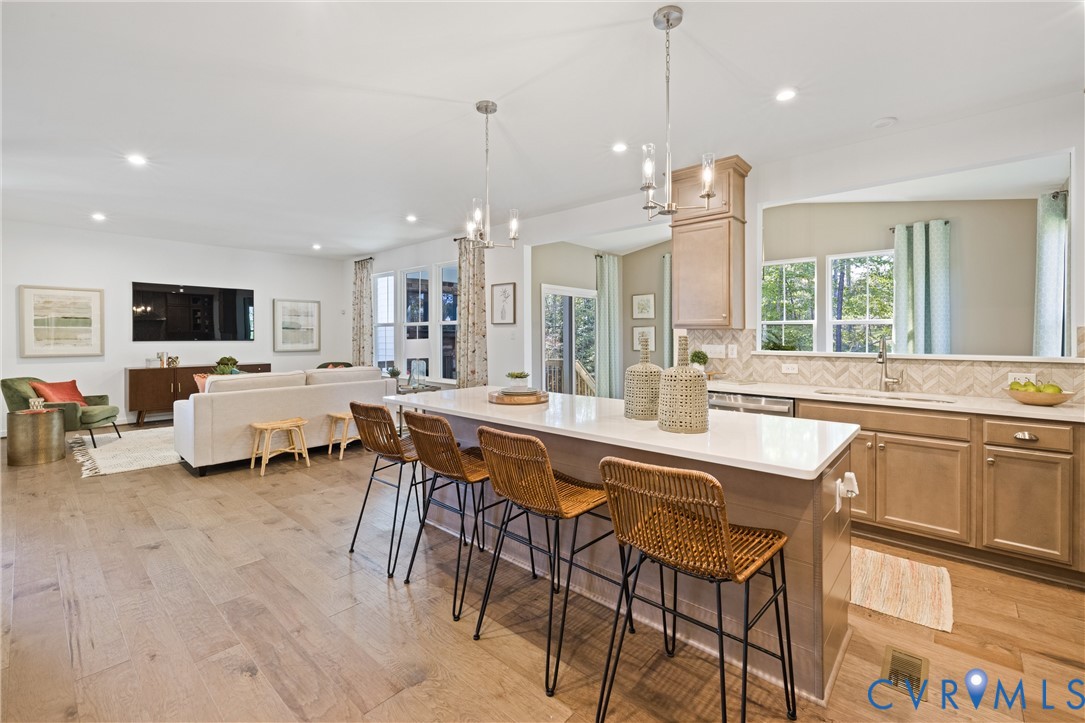 979 Charlemagne Road Midlothian, VA 23114 - Photo 18 of 50 a large kitchen with a table and chairs
