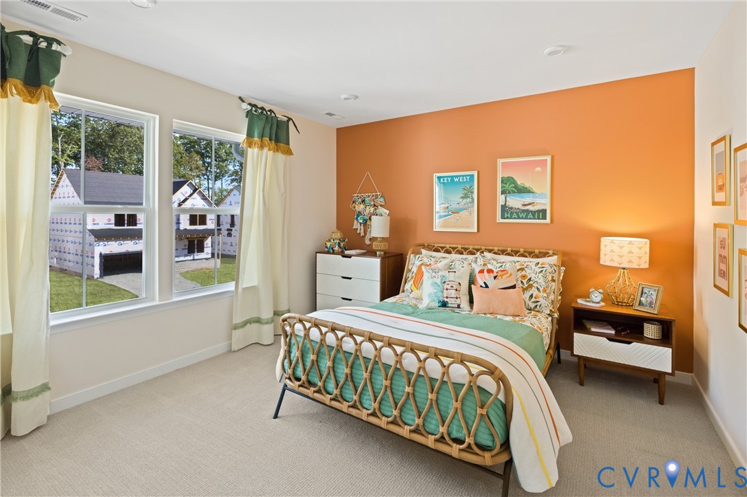 979 Charlemagne Road Midlothian, VA 23114 - Photo 32 of 50 a bedroom with a bed and a window