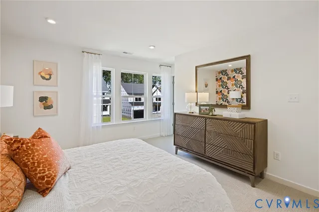 a bed room with a bed and a couch