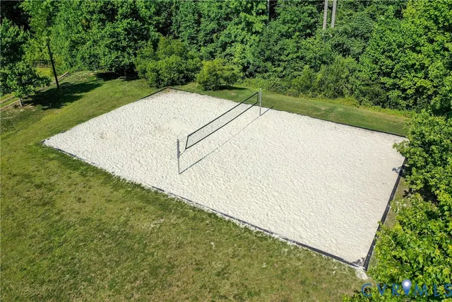 a view of a swimming pool with an outdoor seating