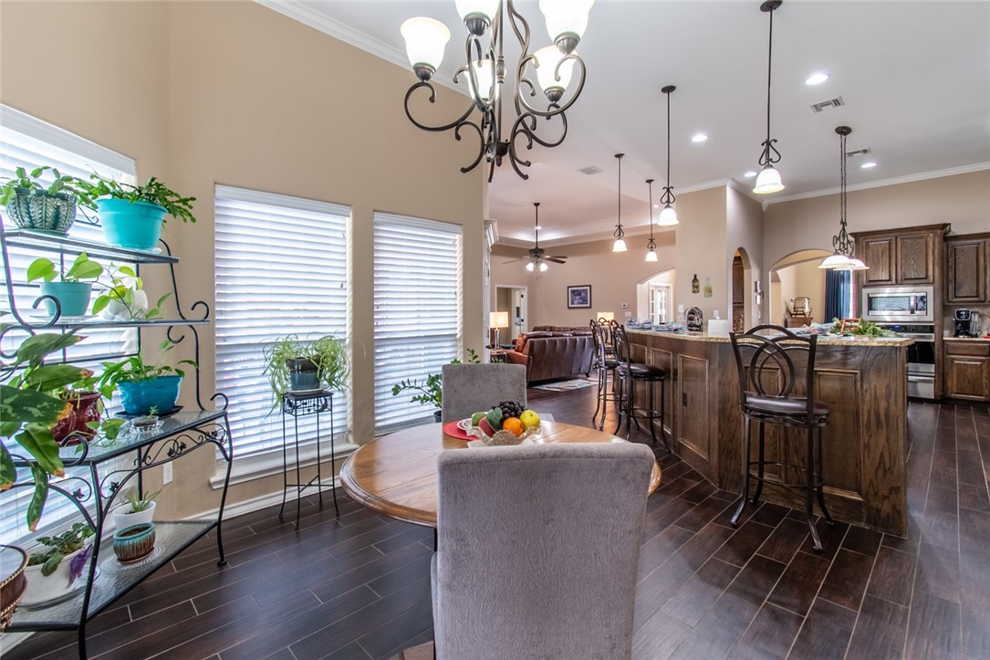 5309 Capernaum Court Corpus Christi, TX 78413 - Photo 21 of 40 a living room filled with furniture kitchen view and a large window