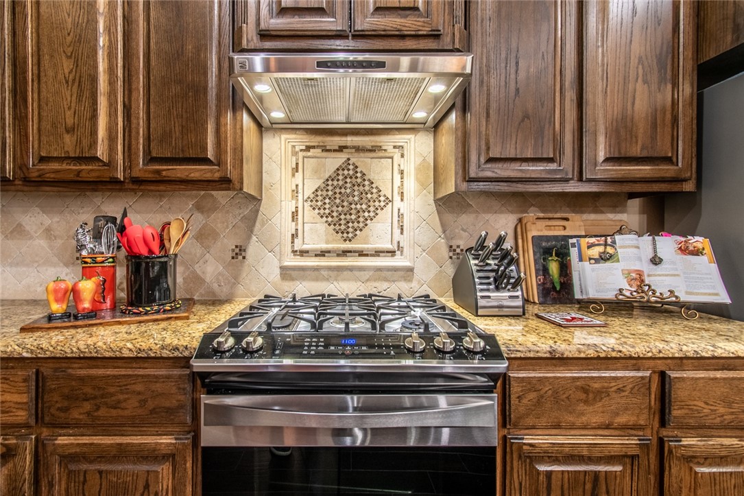 5309 Capernaum Court Corpus Christi, TX 78413 - Photo 25 of 40 a stove top oven sitting inside of a kitchen