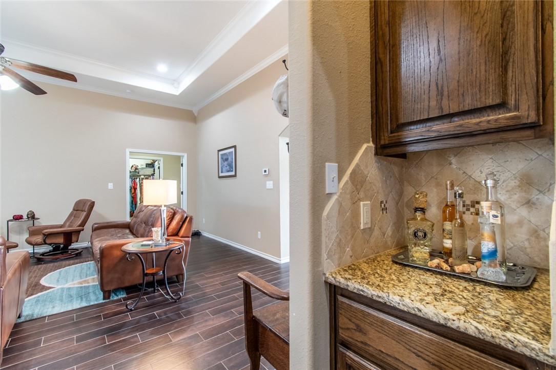 5309 Capernaum Court Corpus Christi, TX 78413 - Photo 29 of 40 a living room with furniture and wooden floor