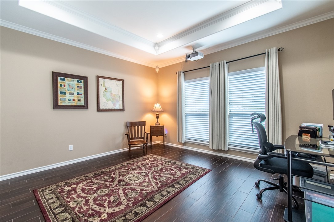 5309 Capernaum Court Corpus Christi, TX 78413 - Photo 32 of 40 a bedroom with furniture and a window
