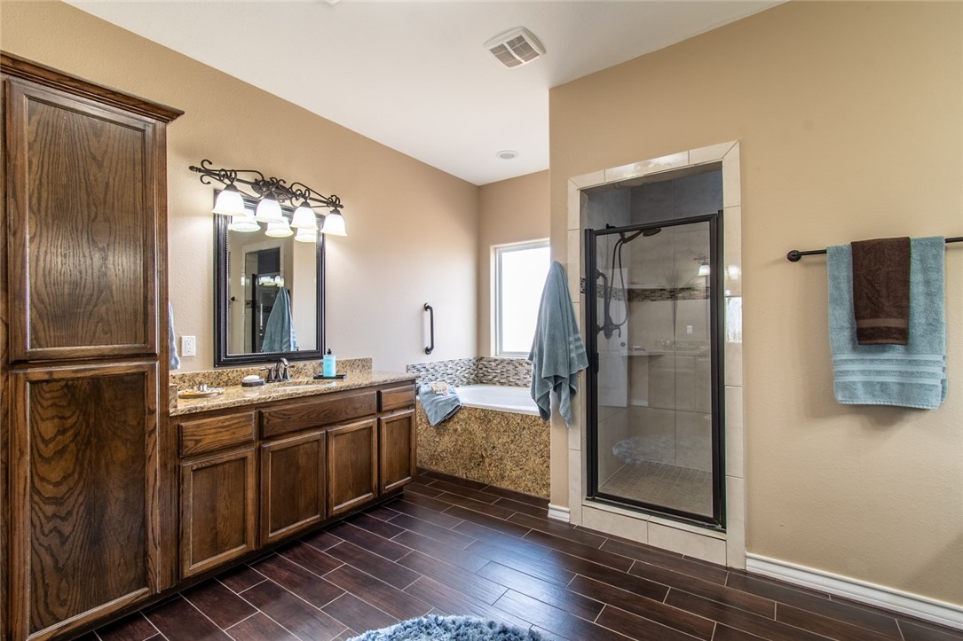 5309 Capernaum Court Corpus Christi, TX 78413 - Photo 6 of 40 a kitchen with stainless steel appliances granite countertop a refrigerator and a sink