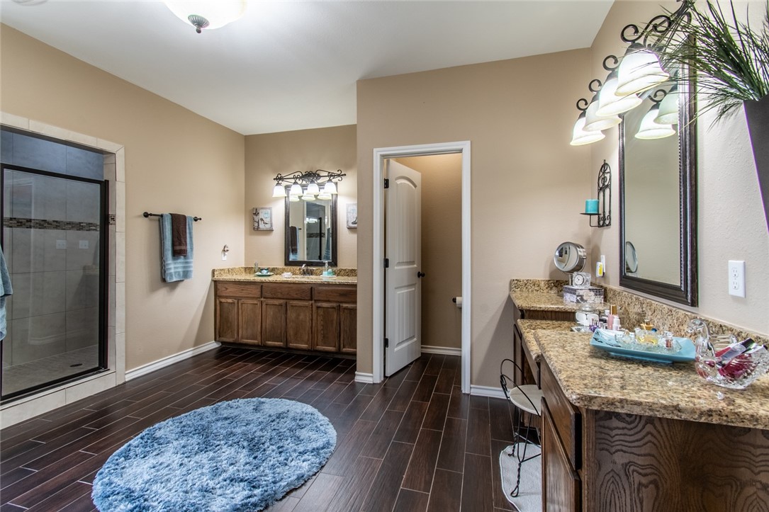 5309 Capernaum Court Corpus Christi, TX 78413 - Photo 7 of 40 a large kitchen with a table and refrigerator