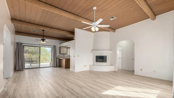 a view of a livingroom with a flat screen tv