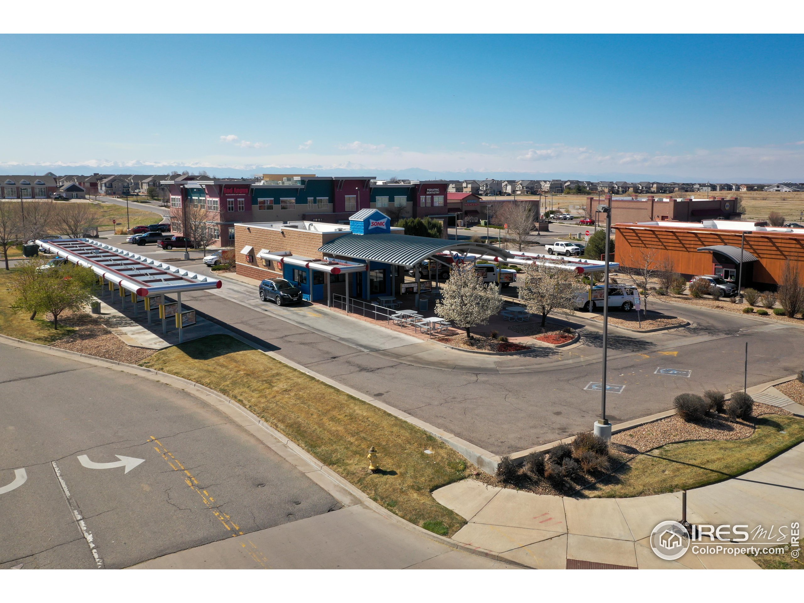 10319 Tower Road Commerce City, CO 80022 - Photo 12 of 13 a picture of a living room with furniture