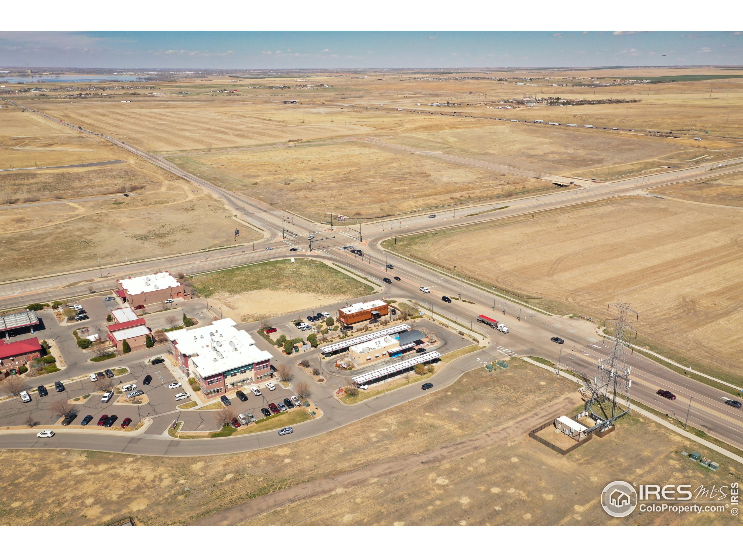 10319 Tower Road Commerce City, CO 80022 - Photo 2 of 13 a view of a ocean beach