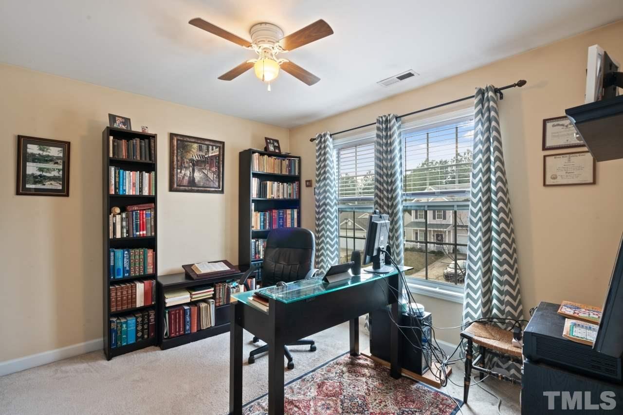 2307 King Malcolm Lane Zebulon, NC 27597 - Photo 14 of 30 a view of a livingroom with workspace and a window