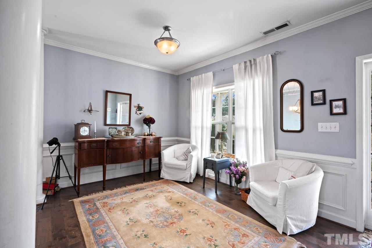 2307 King Malcolm Lane Zebulon, NC 27597 - Photo 3 of 30 a living room with furniture and a window