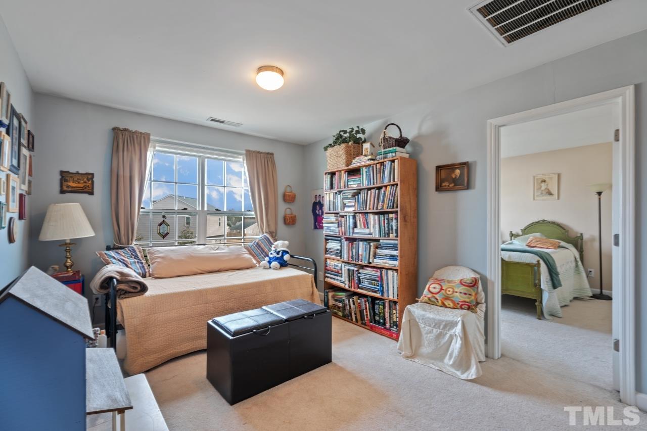 2307 King Malcolm Lane Zebulon, NC 27597 - Photo 27 of 30 a room with furniture and a window
