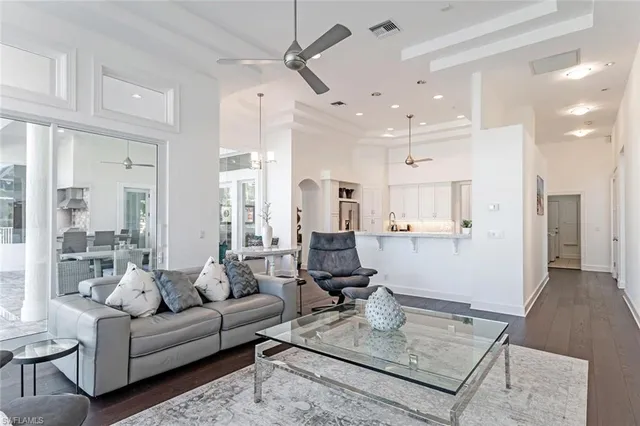 a living room with furniture and a rug