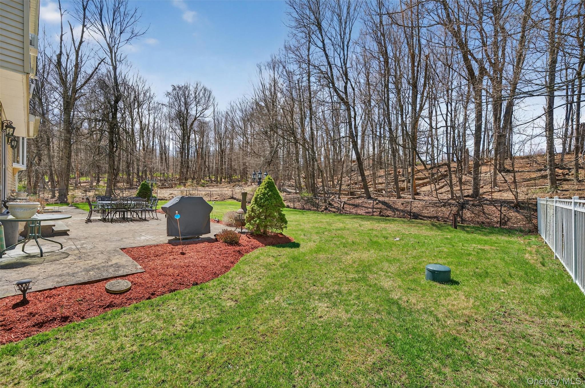 449 West Mombasha Road Monroe, NY 10950 - Photo 23 of 39 a view of a backyard with sitting area