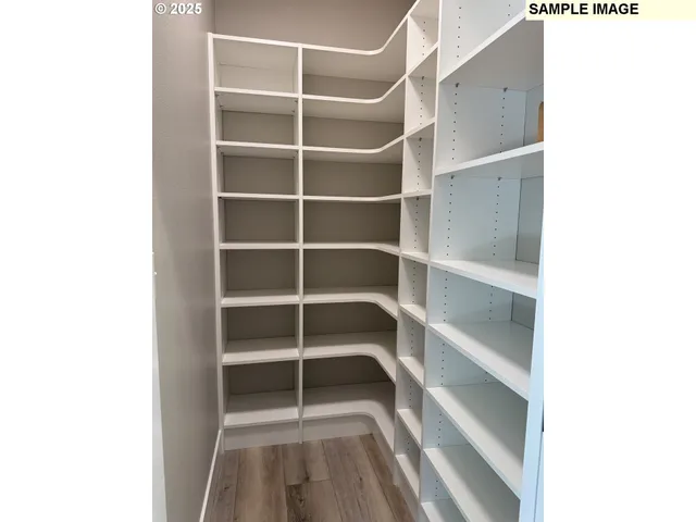 a view of an empty room with empty racks