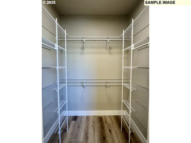 a bathroom with a glass door shower