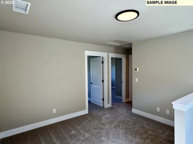 a view of a room with a fan