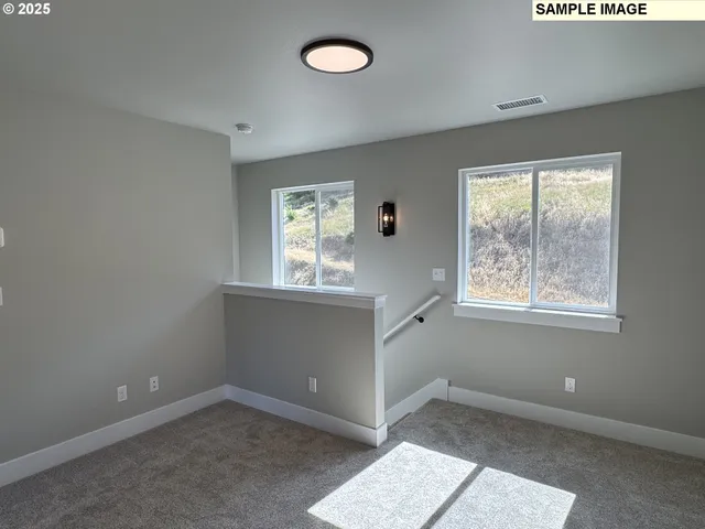 an empty room with windows