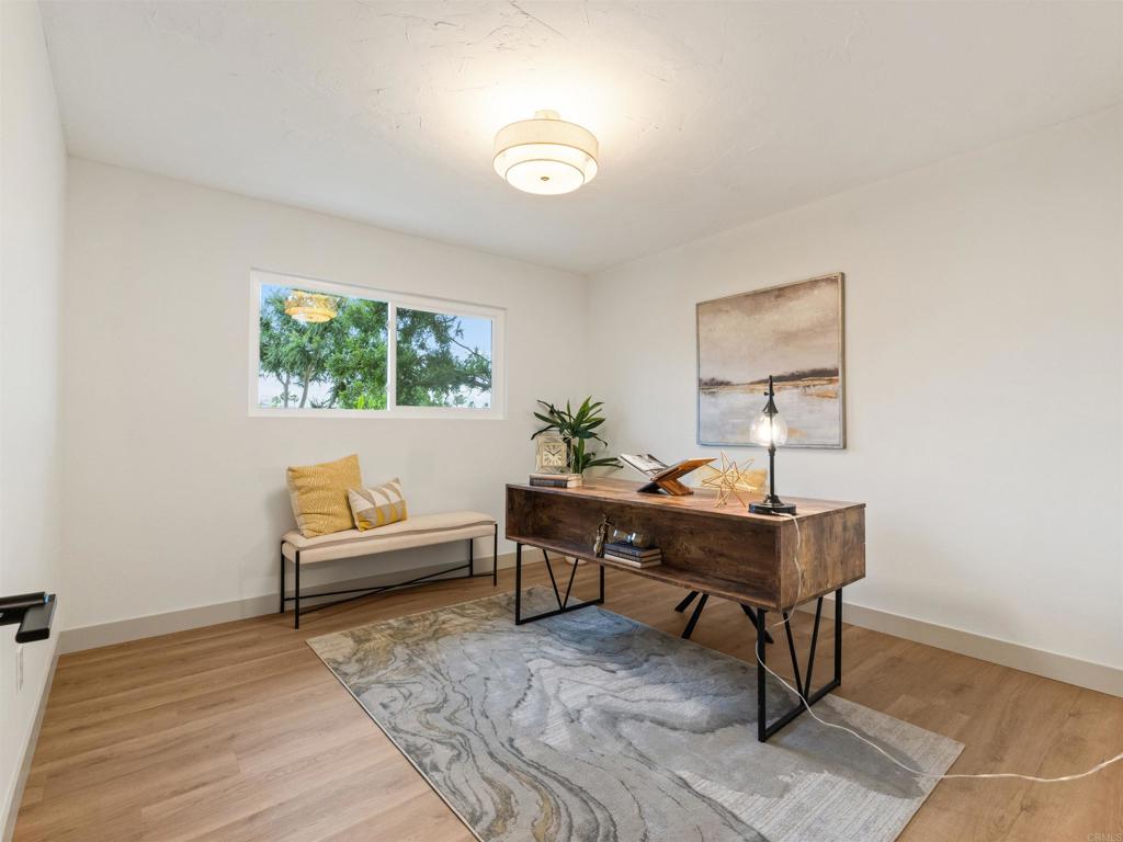 13737 Temple Street Poway, CA 92064 - Photo 26 of 38 a view of a workspace with furniture