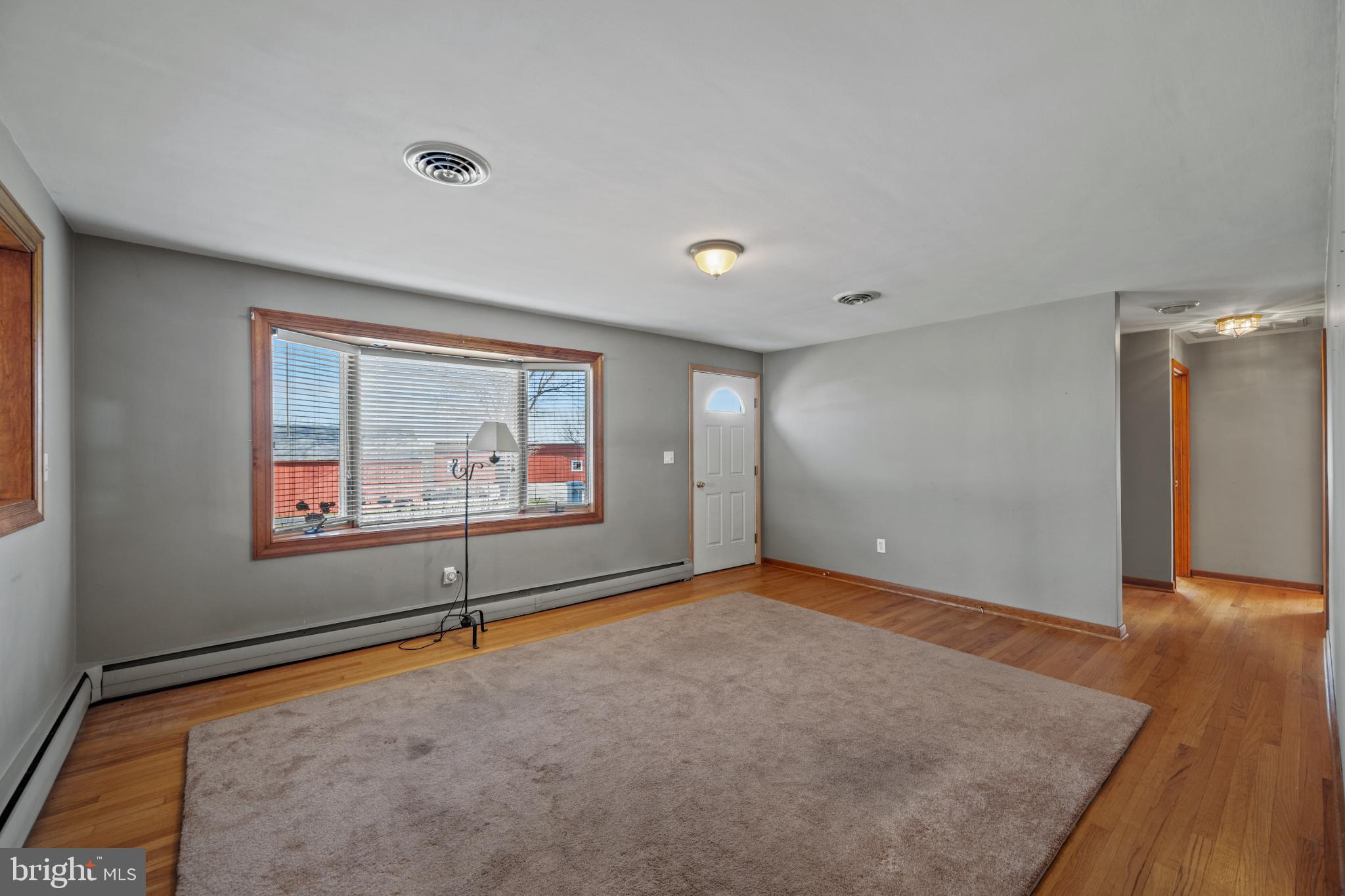 4929 Millers Station Road Hampstead, MD 21074 - Photo 11 of 56 Bright and airy living room with natural light.