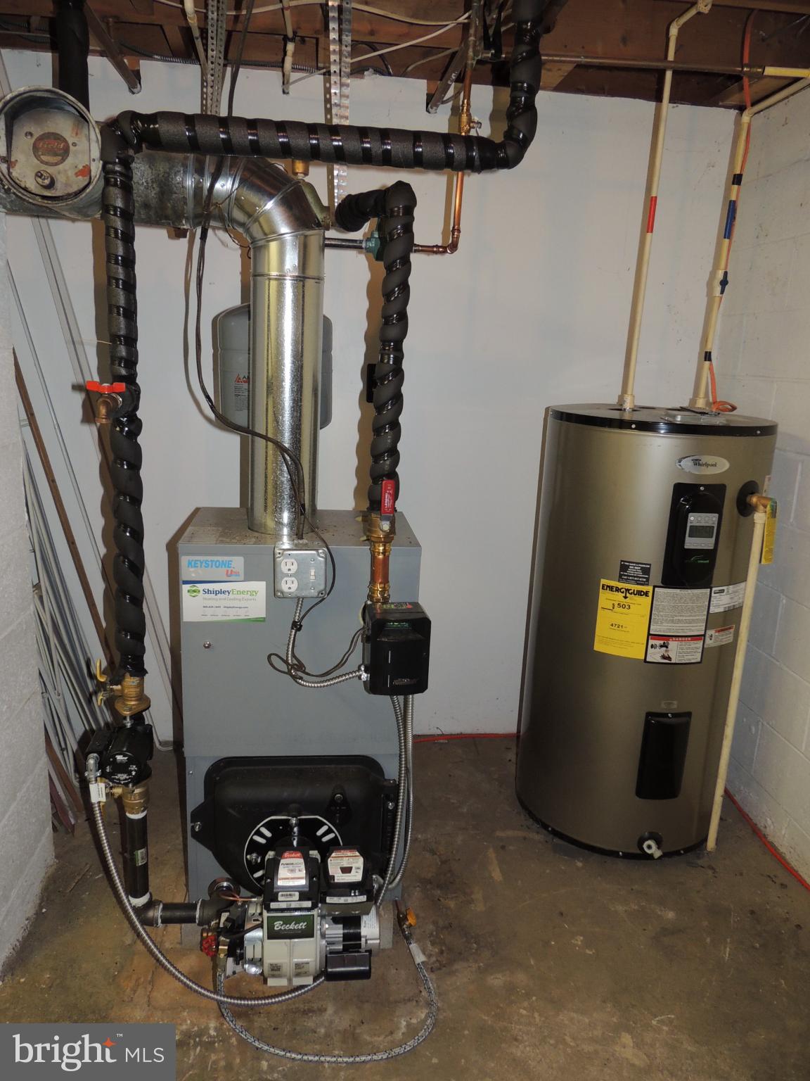 4929 Millers Station Road Hampstead, MD 21074 - Photo 40 of 56 Home heating and water systems in basement.