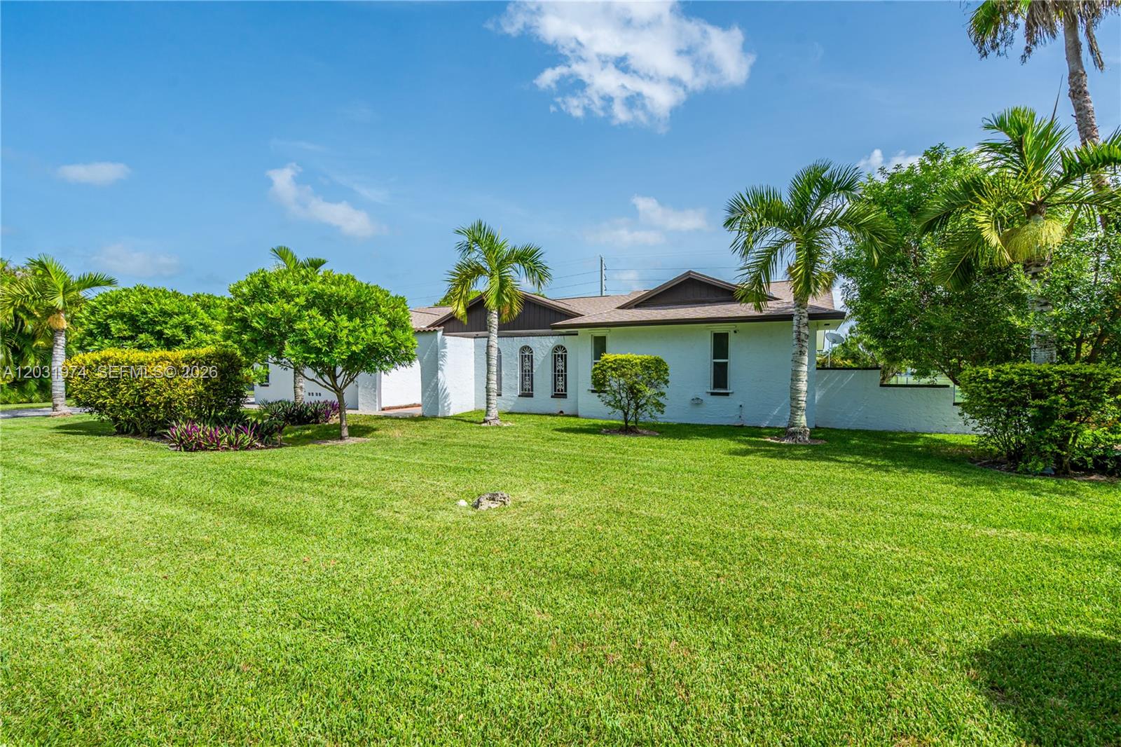 9380 Southwest 134th Street Miami, FL 33176 - Photo 2 of 36 The front is welcoming with the rear yard fully fenced.