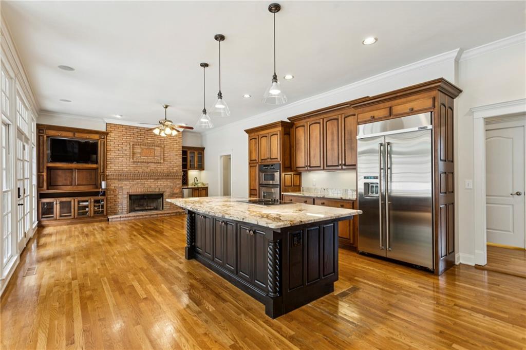 2115 Euharlee Road Taylorsville, GA 30178 - Photo 20 of 66 a kitchen with granite countertop a stove and a refrigerator