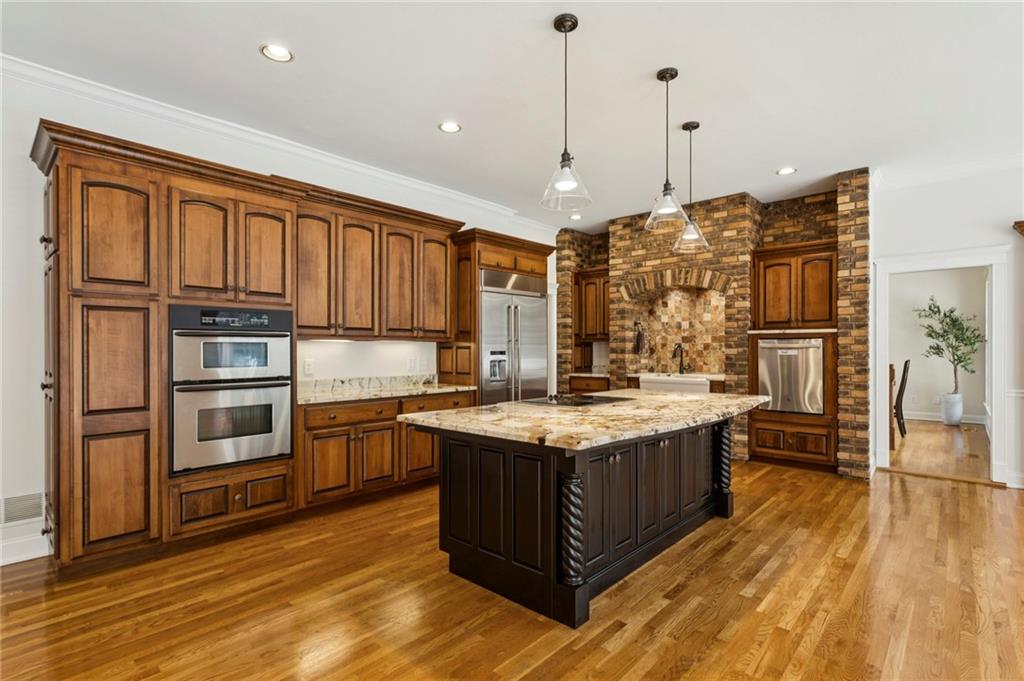 2115 Euharlee Road Taylorsville, GA 30178 - Photo 21 of 66 a kitchen with stainless steel appliances granite countertop a stove and cabinets
